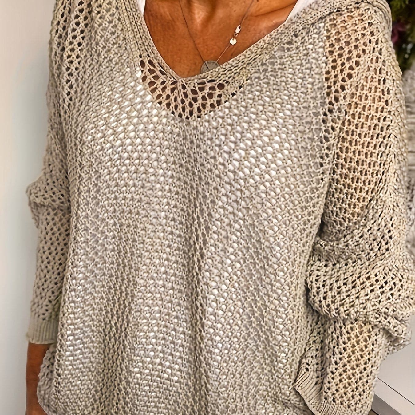 Karla | løst striksweater med åben struktur og hætte til hverdagen