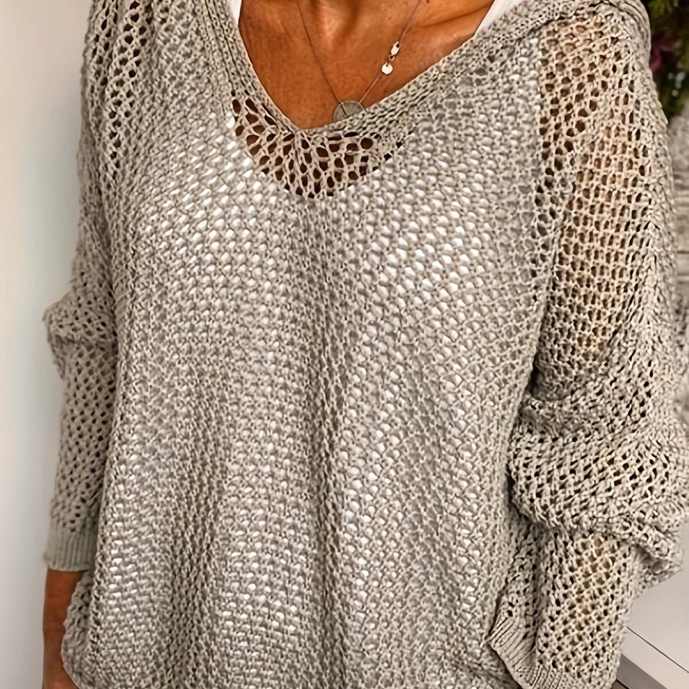 Karla | løst striksweater med åben struktur og hætte til hverdagen