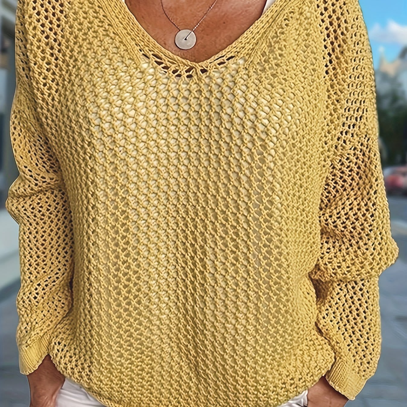 Karla | løst striksweater med åben struktur og hætte til hverdagen