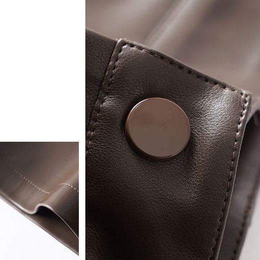 Bukser med vide ben, mellemhøj talje, buede sidelommer og let skinnende overflade vist forfra._9