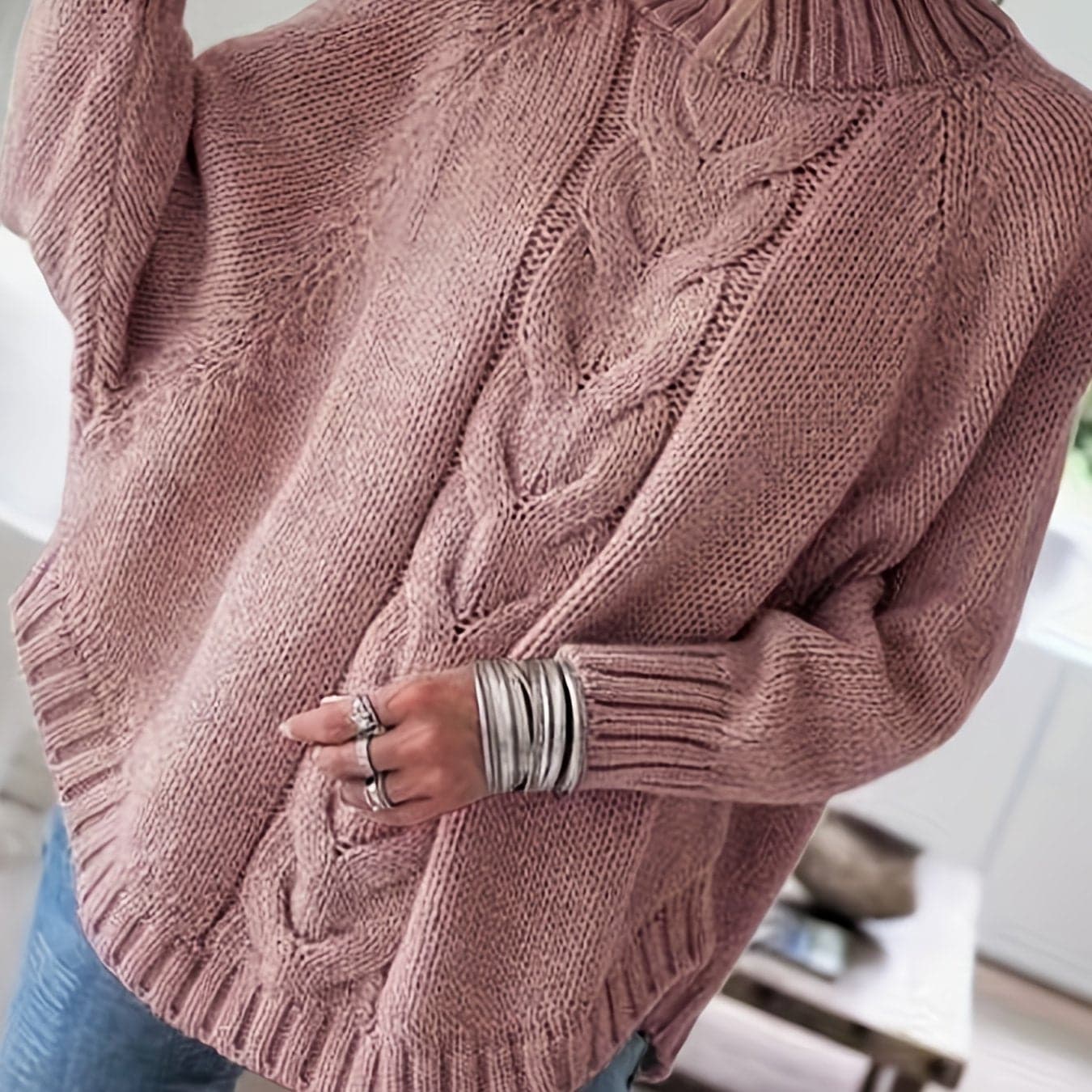Lykke | sweater med høj hals og snoninger i afslappet pasform