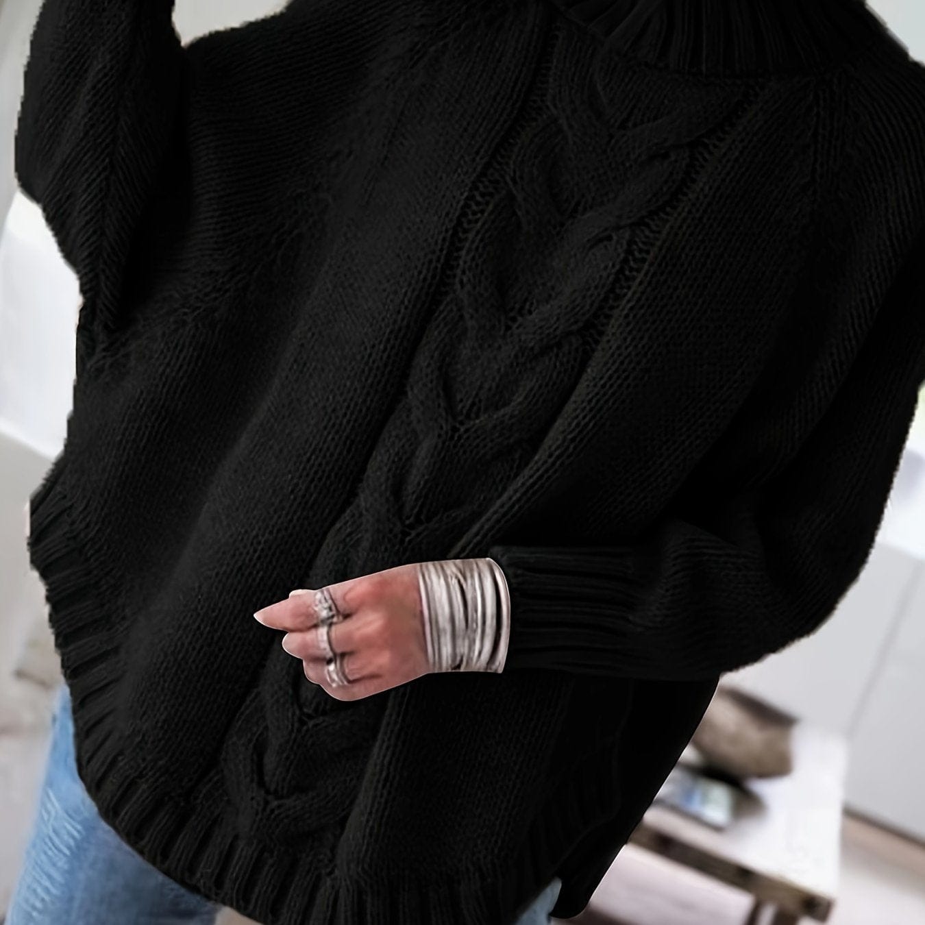 Lykke | sweater med høj hals og snoninger i afslappet pasform